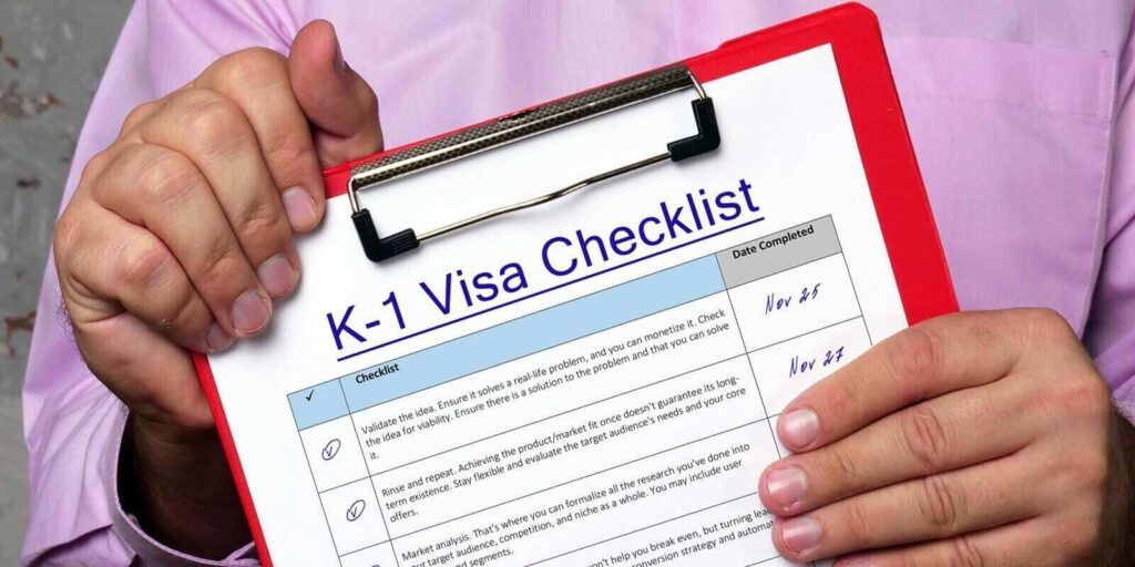 a man holding checklist of chinese k visa requirements