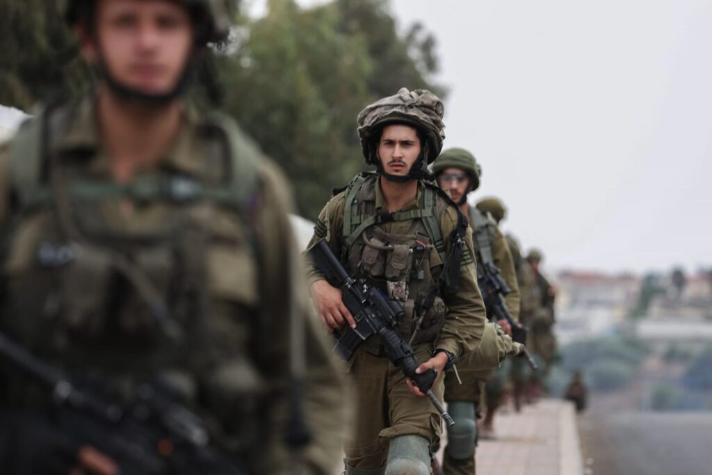 Israeli soldiers walking in Gaza